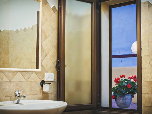 Cala Gonone Italia Último Minuto Código de Descuento Booking.com
