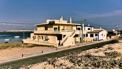 Praia de Faro Portugal Último Minuto Código de Descuento Booking.com
